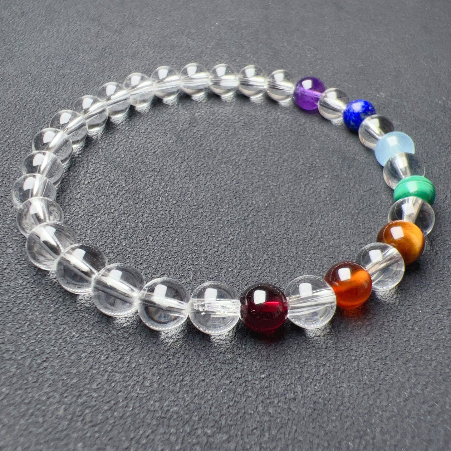 Handmade Seven Chakra Bracelet | Natural Healing Crystals: Clear Quartz, Amethyst, Lapis Lazuli, Aquamarine, Malachite, Brown Tiger Eye, Garnet