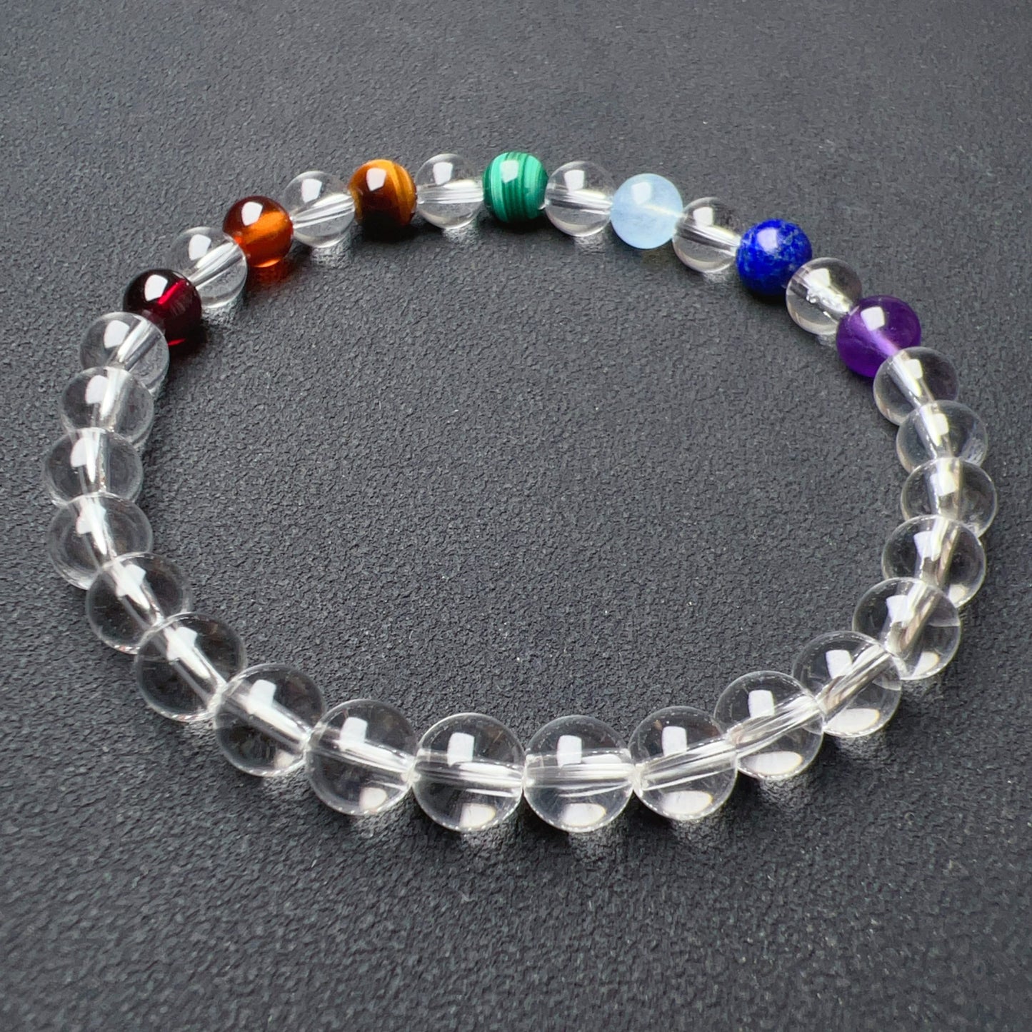 Handmade Seven Chakra Bracelet | Natural Healing Crystals: Clear Quartz, Amethyst, Lapis Lazuli, Aquamarine, Malachite, Brown Tiger Eye, Garnet