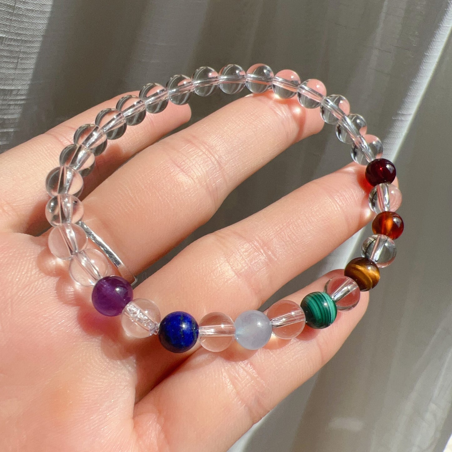 Handmade Seven Chakra Bracelet | Natural Healing Crystals: Clear Quartz, Amethyst, Lapis Lazuli, Aquamarine, Malachite, Brown Tiger Eye, Garnet