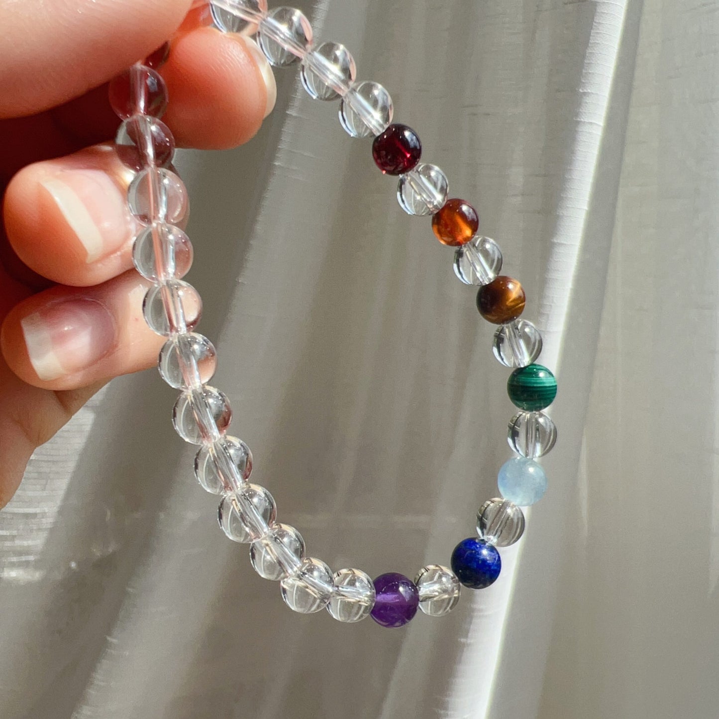 Handmade Seven Chakra Bracelet | Natural Healing Crystals: Clear Quartz, Amethyst, Lapis Lazuli, Aquamarine, Malachite, Brown Tiger Eye, Garnet
